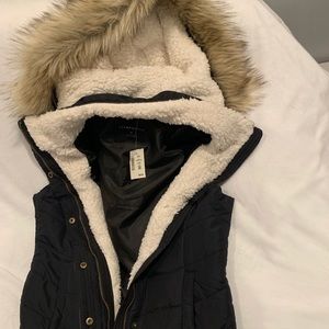 Faux fur hooded puffer vest